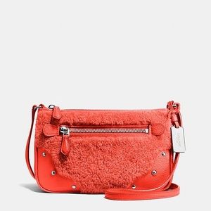NWOT Coach Rhyder Studded Crossbody Orange